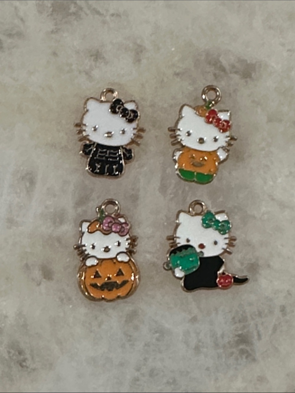 Hello Kitty Halloween Enamel Charms - White, Orange & Green Accents